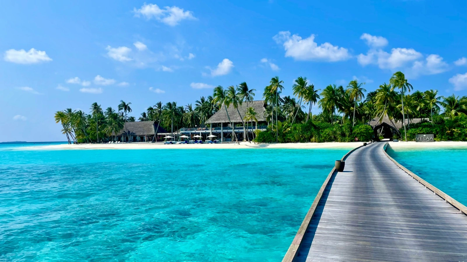 Maldives overwater villa turquoise lagoon